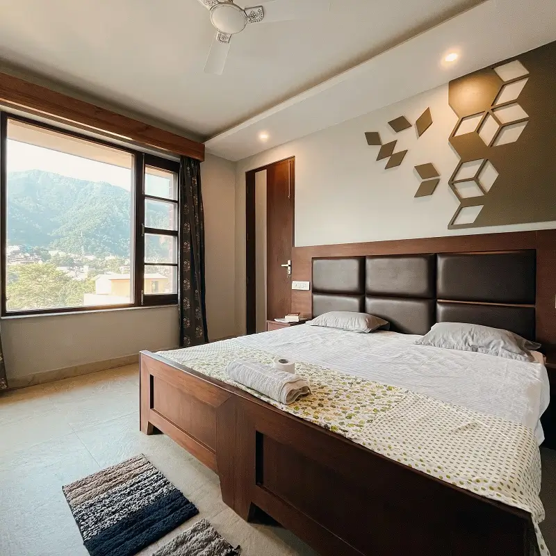 Deluxe double room with balcony and valley view at World Hindu Centres